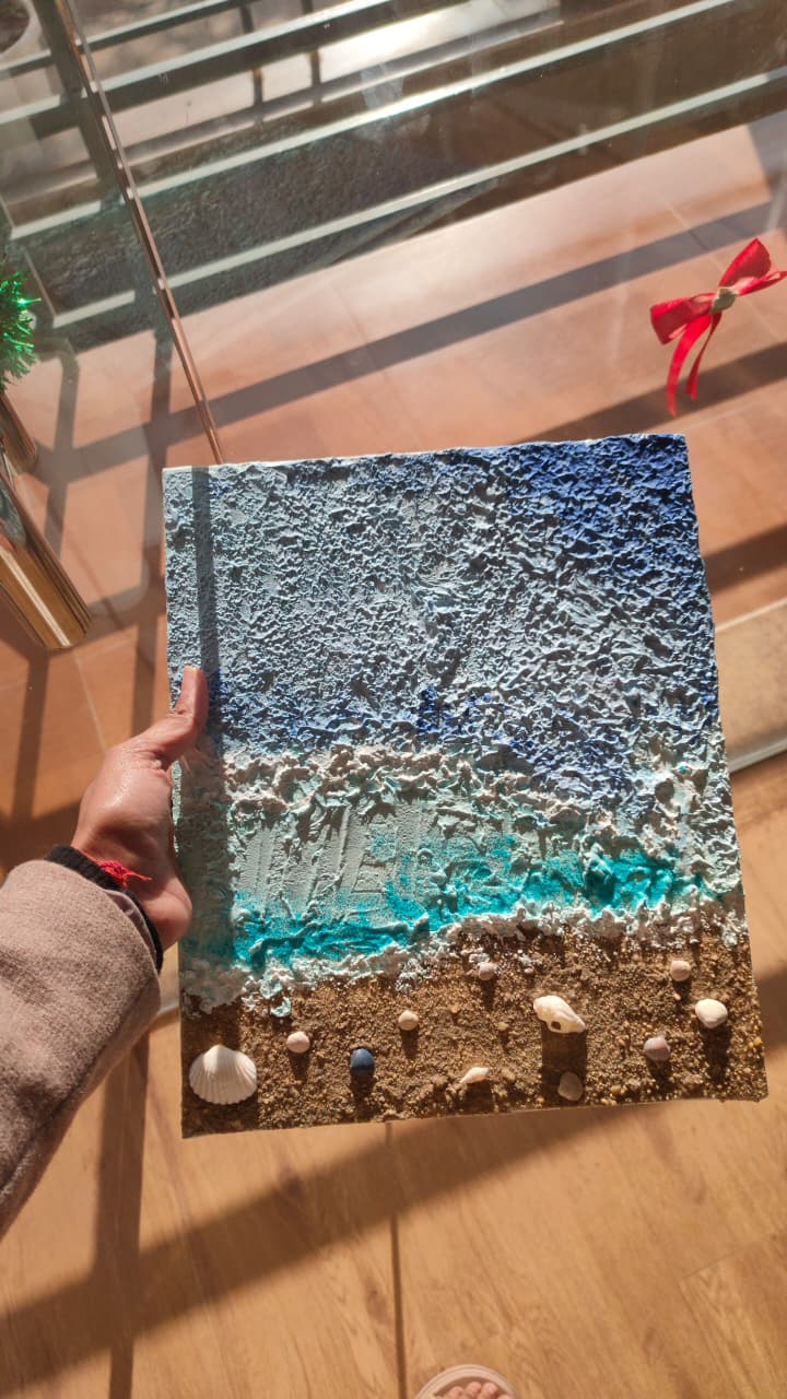 A textured ocean-themed painting