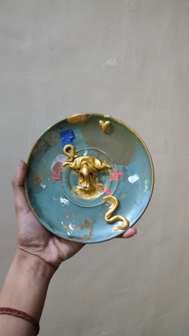 Painted ceramic piece